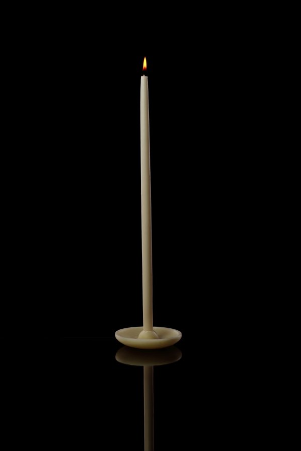 Indulge in the timeless elegance of our Dipped Dinner Candle, 40cm. These refined candles offer extended burn time for those special occasions, casting a warm and inviting glow over your gathering