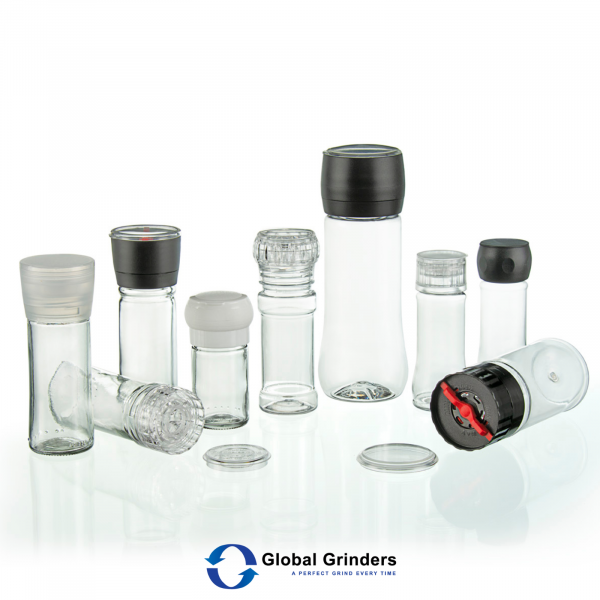 Assortment of Salt and Pepper Grinders fitted on empty bottles for spice packaging